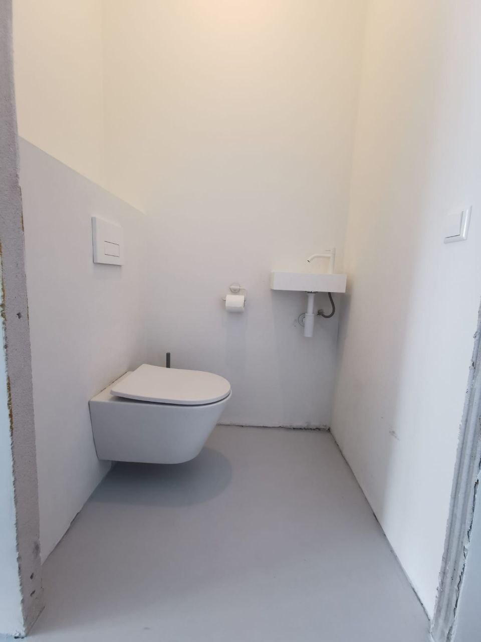 Strak afgewerkt toilet met fontein